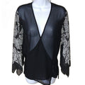New York & Company black sheer kimono blouse with white detailing - front on mannequin