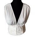 Free People white ruched sleeveless top with deep V-neck - front