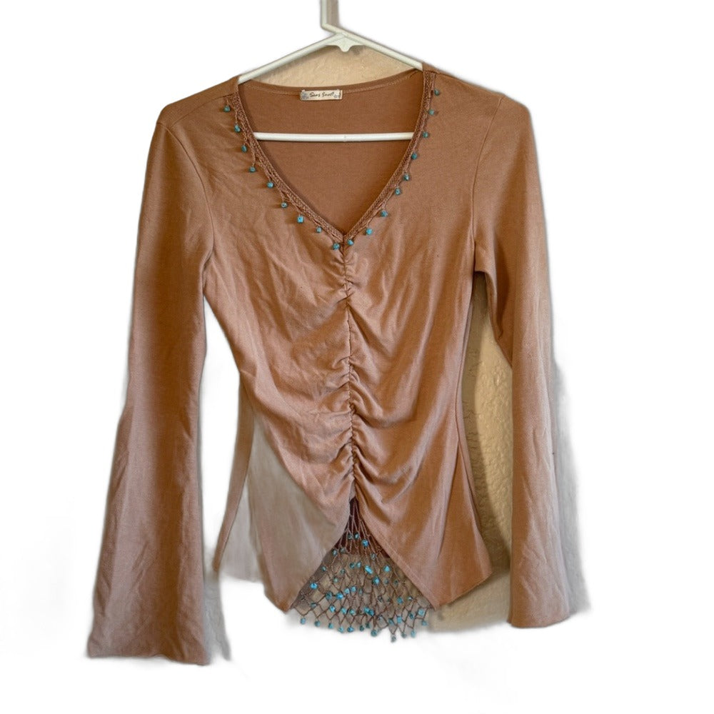 Sans Souci ruched tan top with turquoise beaded trim - front