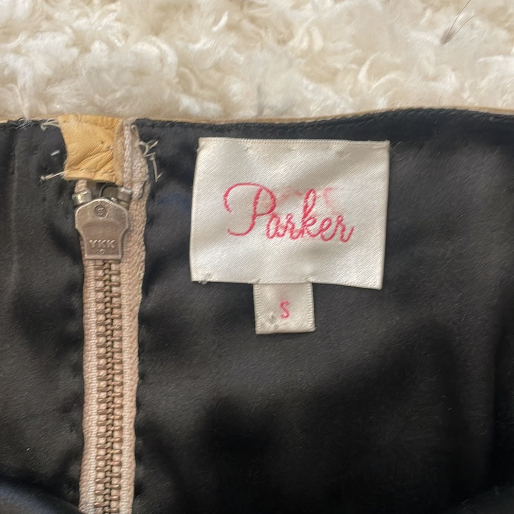 Parker sequin and leather mini skirt - brand label and zipper close-up