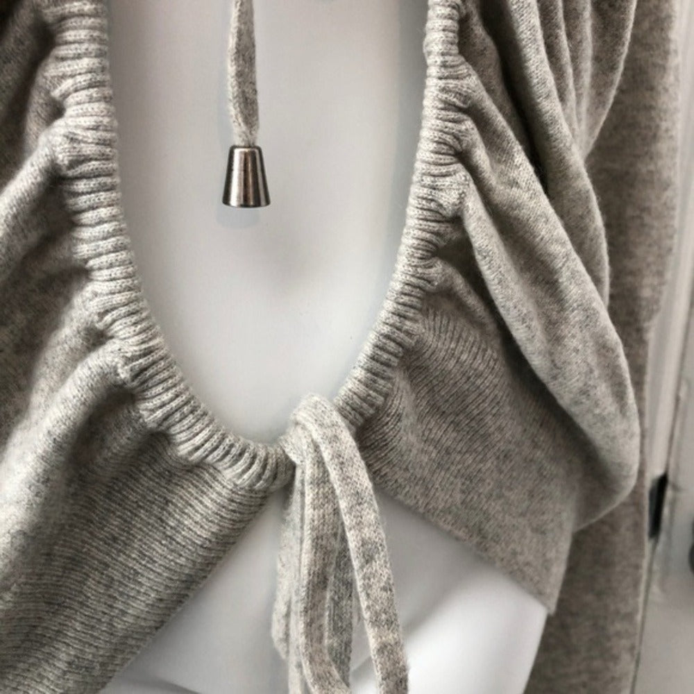 Thomas Wylde cashmere sweater neckline and tie detail - close-up