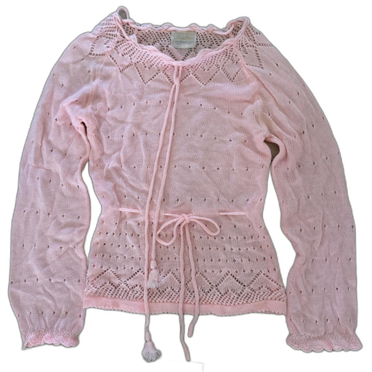 Vintage pink knit sweater with tie front and tassels - flat lay front